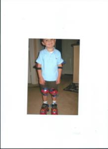 JULIAN IN FIRST PAIR OF SKATES-SPIDERMAN.4.5 YRS OLD