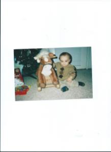 Julian ON CHRISTMAS WITH SINGING ROCKING HORSE